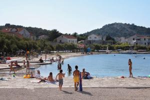 Family friendly apartments with a swimming pool Murter - 20859