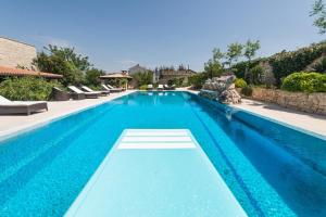 Family friendly apartments with a swimming pool Murter - 20859