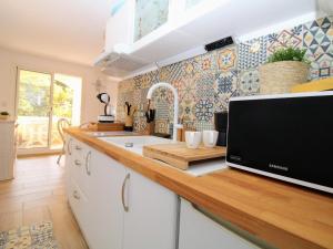 Appartements Saint Cyprien - T2 avec Balcon, Climatisation et Parking a 2 Pas du Port - FR-1-309-305 : photos des chambres