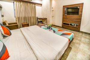 FabHotel Global Inn - Nr Sanjeevani Childrens Hospital