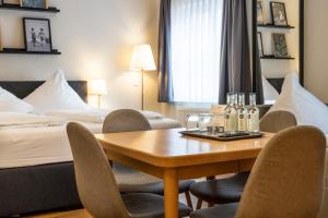 Classic Quadruple Room room in Hotel Beim Schupi Karlsruhe
