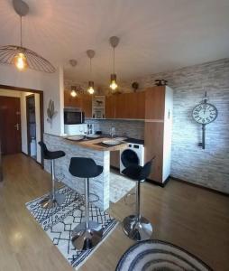 Appartements Grand studio refait a neuf : photos des chambres