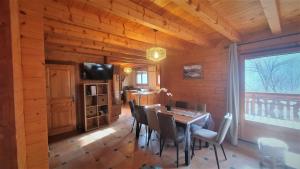 Chalets Ravissant chalet en madrier : photos des chambres