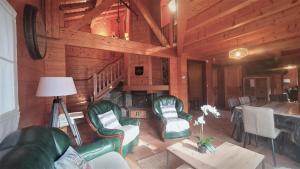 Chalets Ravissant chalet en madrier : photos des chambres