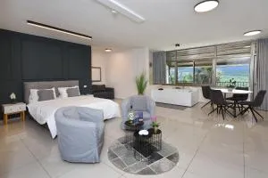 אדם וחווה - סוויטות מפנקות עם ג'קוזי פרטי ובריכה במתחם מול נוף גלילי מושלם - Raqlīyah