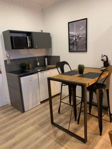 Appartements La Cle des Plaisirs : photos des chambres