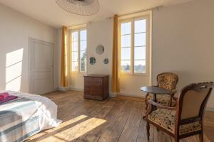 Appartements LaConciergerieJonzac, Maison Cote Vintage avec jardin : photos des chambres