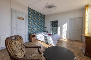 Appartements LaConciergerieJonzac, Maison Cote Vintage avec jardin : photos des chambres