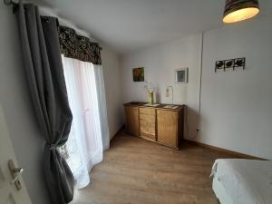 Appartements Hebergement des thermes : photos des chambres