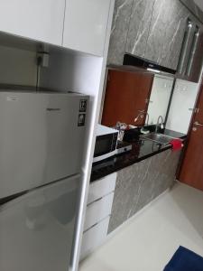 Palam Mansion at Meisterstadt Pollux Habibie Apartment