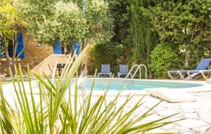 Maisons de vacances Awesome home in Siran with 4 Bedrooms, WiFi and Outdoor swimming pool : photos des chambres