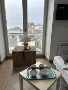 Appartements Le Cocon Bleu - Vue mer : photos des chambres