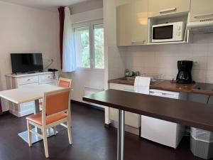 Appart'hotels Les bords de l'Aveyron : photos des chambres