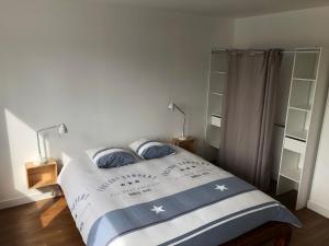 Appartements FENUA : gite 5 chambres 10 couchages en ville : photos des chambres