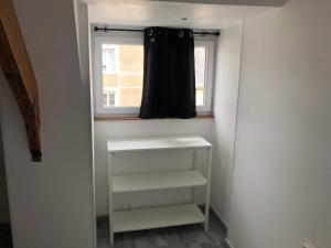 Appartements FENUA : gite 5 chambres 10 couchages en ville : photos des chambres