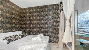 Appartements HOMEY WILD - Proche Gare et Tram - Proche centre - Balcon prive - Parking prive - Wifi gratuit : photos des chambres