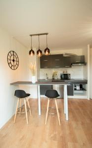 Appartements LES DUNES Studio Cosy-Terrasse-Parking -Proche paris : photos des chambres