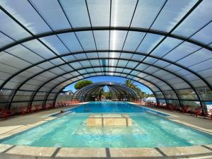 Maisons de vacances Camping Officiel Siblu Mer et Soleil : photos des chambres
