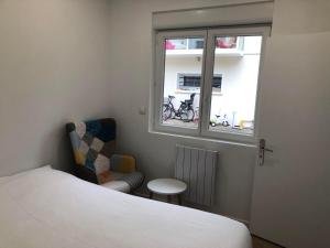 Appartements F2 equipe, 15mn de Paris, parking, climatisation : photos des chambres