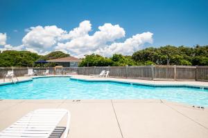 Beach Getaway Among The Oaks by Oak Island Accommodations