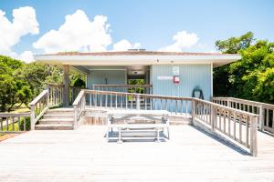 Beach Getaway Among The Oaks by Oak Island Accommodations