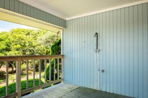 Beach Getaway Among The Oaks by Oak Island Accommodations