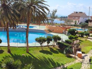 Appartement 60 M2,piscine, commerce