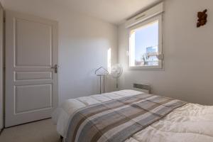 Appartements LaConciergerieJonzac, Appartement La Desirade : photos des chambres