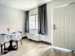 Superior Queen Room with Two Queen Beds room in Travelodge Suites by Wyndham Orange