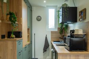 Appartements SUITE JUNGLE - JARDIN, NETFLIX et PARKING - Le Manoir aux Pommes : photos des chambres