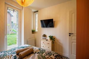 Appartements SUITE JUNGLE - JARDIN, NETFLIX et PARKING - Le Manoir aux Pommes : photos des chambres