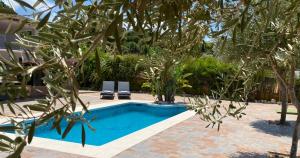 Detached holiday house, 2 bedrooms, private garden, pool