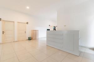 Urbanview Hotel Sabar Residence CSB Mall