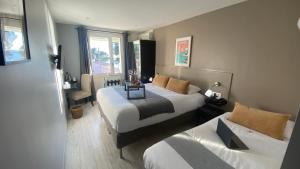 Hotels Hotel La Tuiliere : photos des chambres