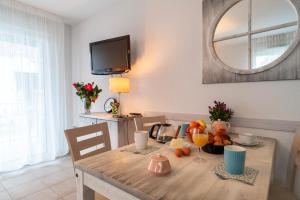 Appartements L'Arvor - Appt piscine et sauna partages : photos des chambres