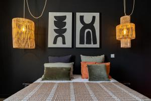 Appart'hotels La Maison de Lyna - Suites de charme intra-muros avec parking & autonomie : photos des chambres