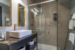 Appart'hotels La Maison de Lyna - Suites de charme intra-muros avec parking & autonomie : photos des chambres
