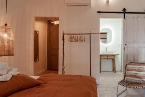 Appart'hotels La Maison de Lyna - Suites de charme intra-muros avec parking & autonomie : photos des chambres