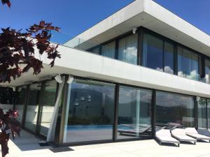 Attersee Luxury Design Villa with dream views, large Pool and Sauna