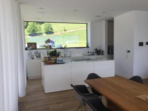 Attersee Luxury Design Villa with dream views, large Pool and Sauna