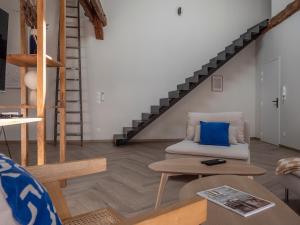 Appartements LE NID BLEU Duplex en plein centre : photos des chambres