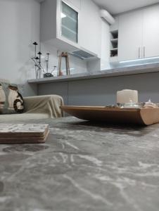 Renovated Basement Duplex with Patio and Folk Decor in the Heart of Athens