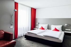 Lounge Room room in Vienna House Easy MO. Stuttgart