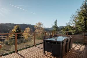 Chalets Le Cerf, chalet cocooning avec piscine et billard : photos des chambres