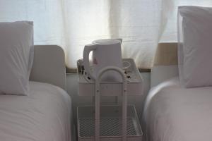 Phòng Tiêu Chuẩn 2 Giường Đơn Với Phòng Tắm Chung (Standard Twin Room with Shared Bathroom)