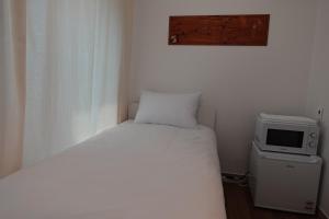 Phòng Đơn Với Phòng Tắm Vòi Sen Và Toilet Chung (Single Room with Shared Shower and Toilet)