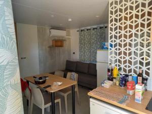 Campings Mobil home yves et magali : photos des chambres