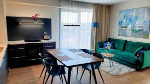 Ferienwohnung A102 mit Komfort in Strandnähe mit Terrasse und Meerblick in 10ter Etage PARKING FREE