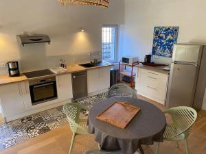 Appartements La Cave : photos des chambres