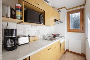 Appartements Appartement Les Sapins 11 Happy Rentals : photos des chambres